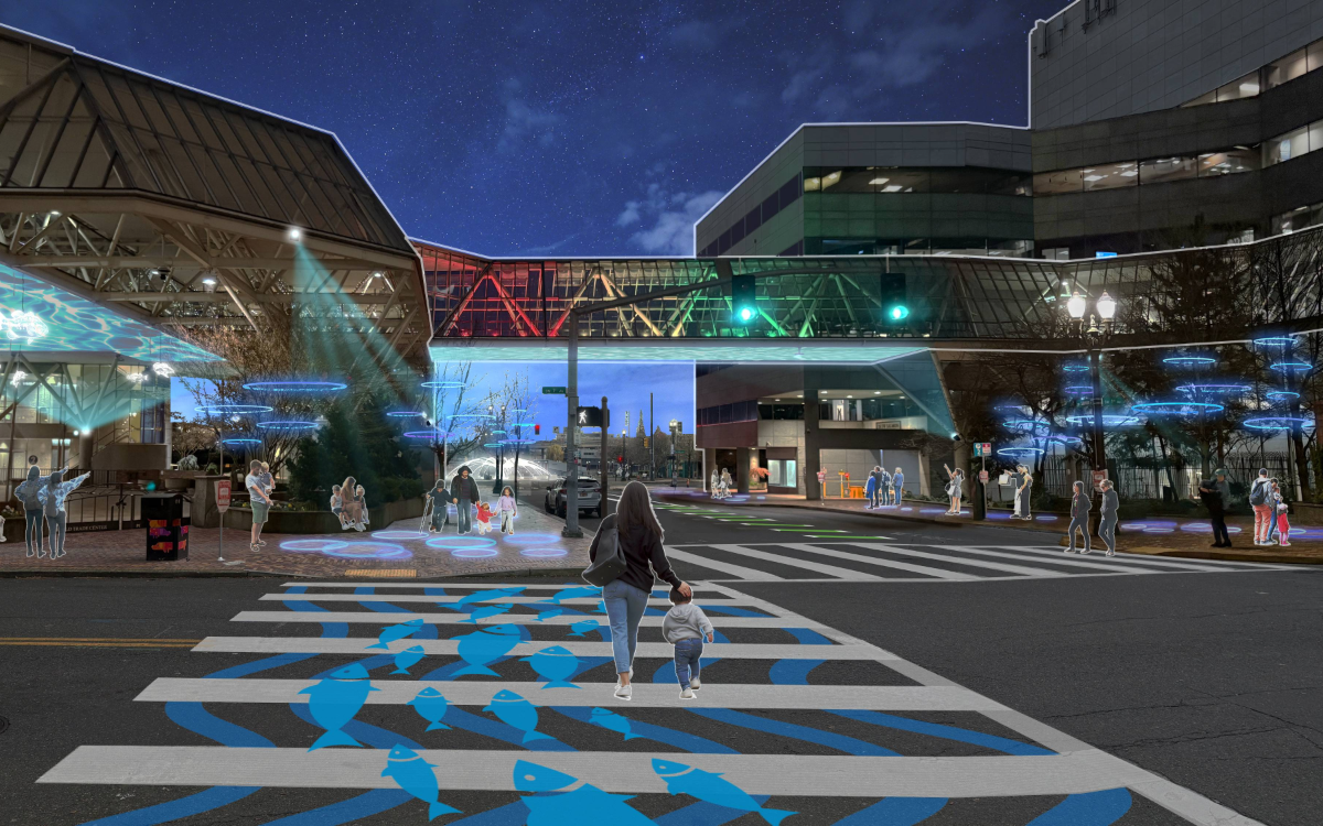 A rendering of Salmon Street at night at the World Trade Center with artistic lighting in the skyway and colorful ground-plane graphics in the crosswalk