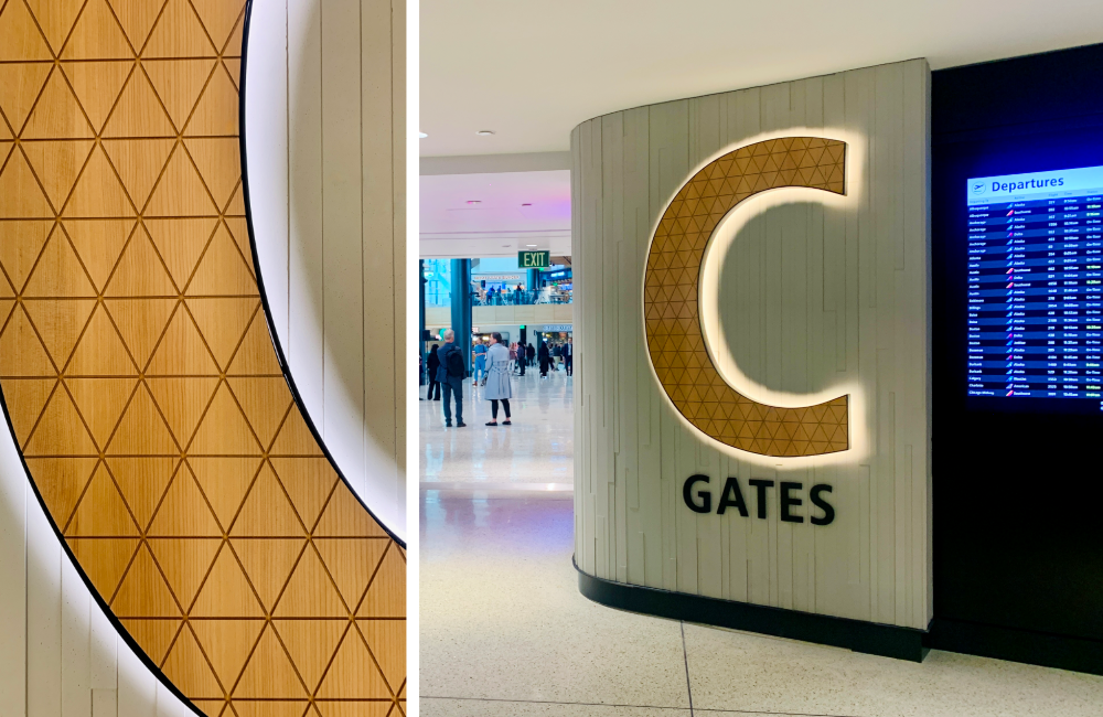 Two images of the landmark "C" sign marking the C Councourse at Seattle-Tacoma International Airport. Image on the left is a detail that shows the wood-pattern.